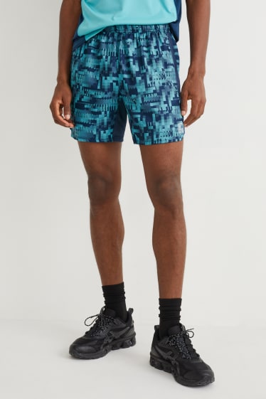 Home - Pantalons curts tècnics - blau / blau fosc