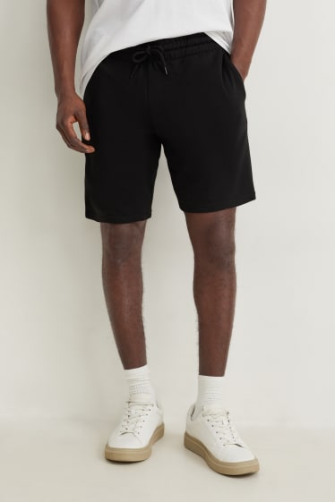 Hombre - Shorts deportivos - negro