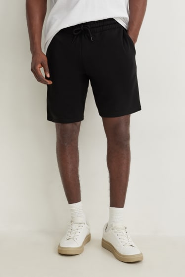 Uomo - Shorts di felpa - nero