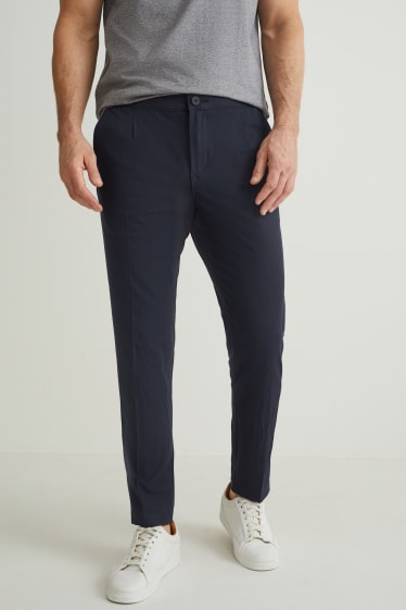 Home - Pantalons xinos - tapered fit - Flex - blau fosc
