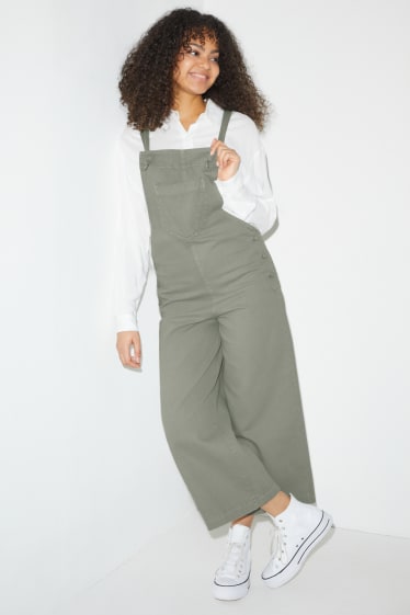 Dona - CLOCKHOUSE - pantalons de peto - wide leg - verd clar