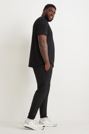 Hommes - Pantalon de jogging - noir