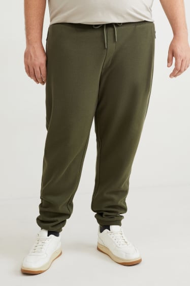 Uomo - Pantaloni sportivi - verde scuro