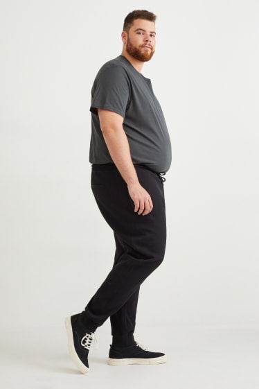 Uomo - Pantaloni sportivi - nero