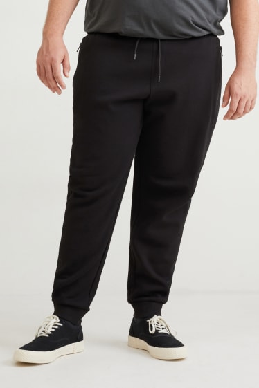 Uomo - Pantaloni sportivi - nero