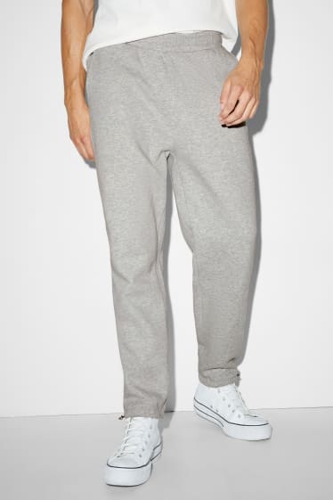 Home - Pantalons de xandall - gris clar jaspiat