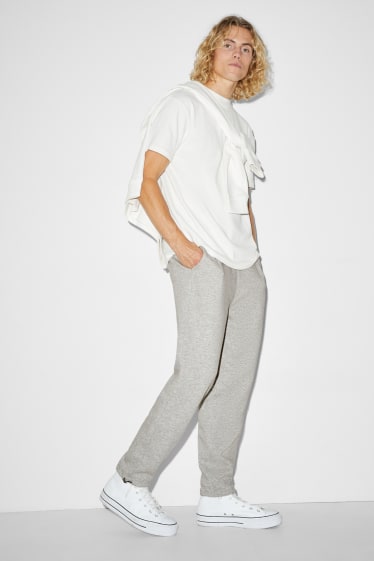 Home - Pantalons de xandall - gris clar jaspiat