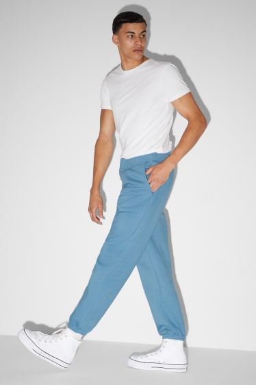Mężczyźni - Spodnie dresowe - niebieski