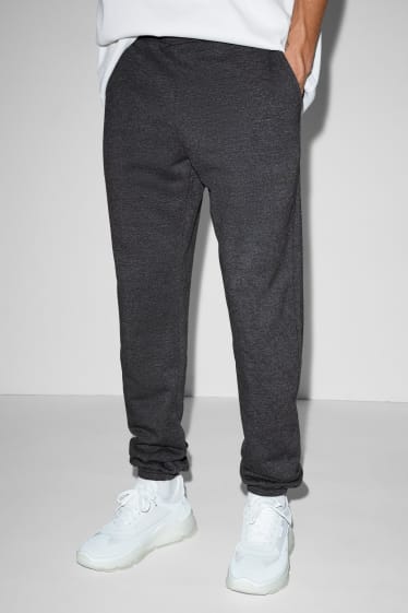 Uomo - Pantaloni sportivi - grigio melange