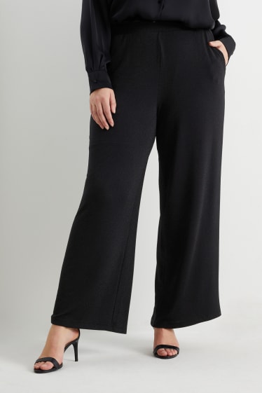 Ados & jeunes adultes - CLOCKHOUSE- pantalon en jersey - wide leg - noir