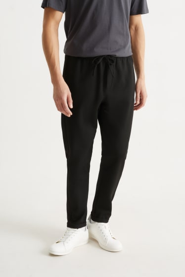 Bărbați - Pantaloni de trening - negru
