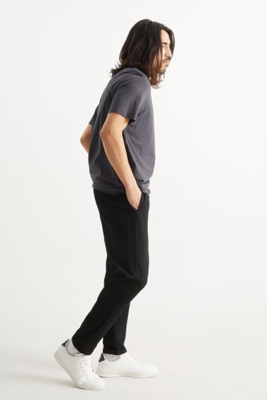 Bărbați - Pantaloni de trening - negru