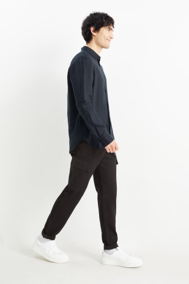 Mężczyźni - Spodnie bojówki - tapered fit - miks z lnem - czarny