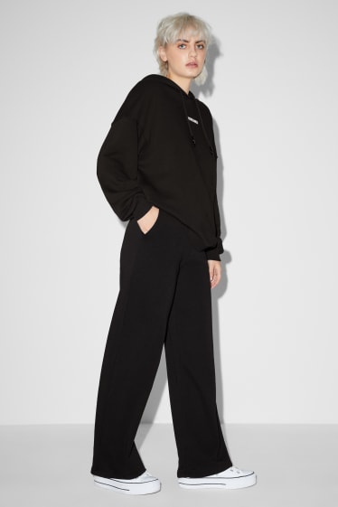 Dona - CLOCKHOUSE - pantalons de xandall - negre