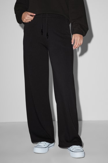 Dona - CLOCKHOUSE - pantalons de xandall - negre