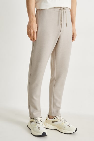 Uomo - Pantaloni sportivi - beige