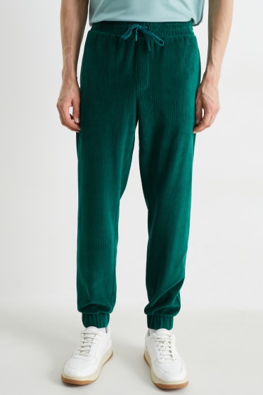 Herren - Samt-Jogginghose - dunkelgrün