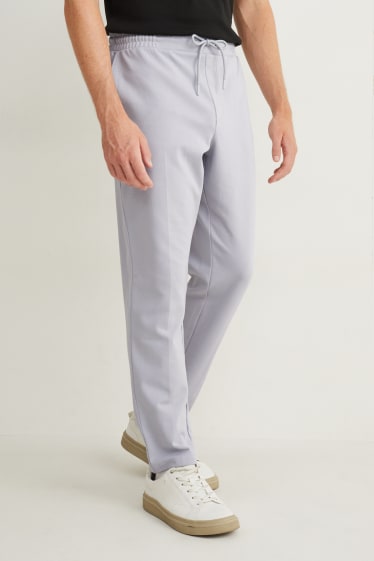 Mężczyźni - Spodnie dresowe - Flex  - jasnoszary