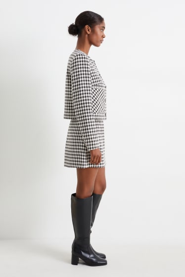 Femmes - Mini-jupe - à carreaux - noir / blanc