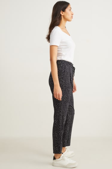 Damen - Stoffhose - High Waist - Tapered Fit - gepunktet - schwarz / weiß
