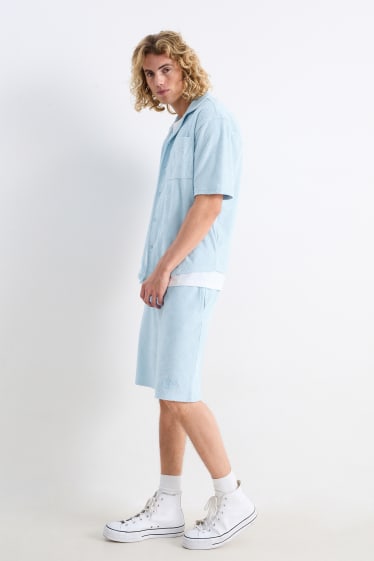 Men - Terry cloth sweat shorts - light blue