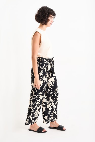 Dona - Pantalons de tela - high waist - wide leg - de flors - beix clar