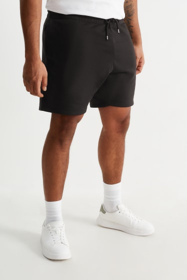 Uomo - Shorts in felpa - nero