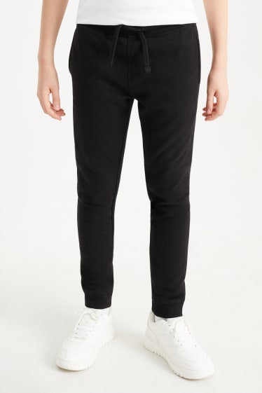 Kinder Buben - Jogginghose - genderneutral - schwarz