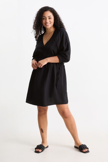 Damen - A-Linien Kleid mit V-Ausschnitt - schwarz
