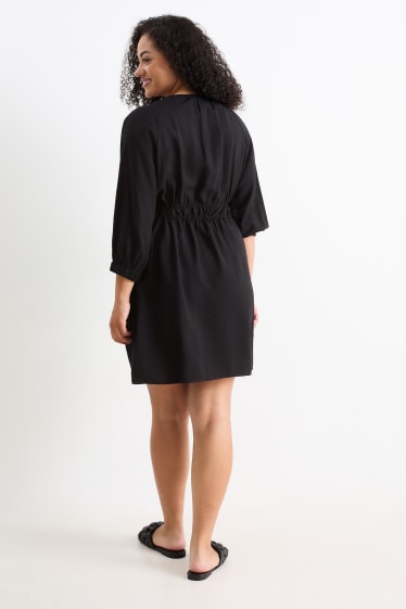 Damen - A-Linien Kleid mit V-Ausschnitt - schwarz