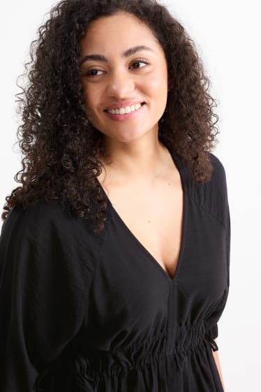 Damen - A-Linien Kleid mit V-Ausschnitt - schwarz