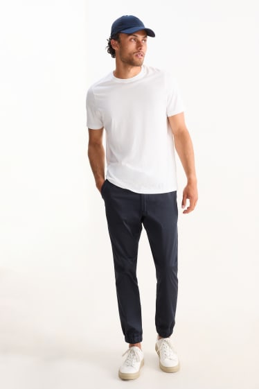 Hommes - Pantalon de jogging - tapered fit - bleu foncé