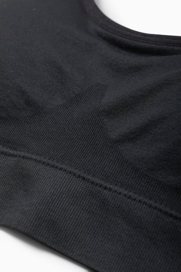 Dámské - Sportovní podprsenka - s vycpávkami - bezešvá - černá