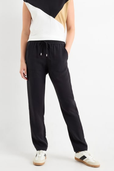 Dámské - Plátěné kalhoty - high waist - tapered fit - černá