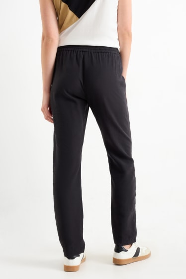 Dámské - Plátěné kalhoty - high waist - tapered fit - černá