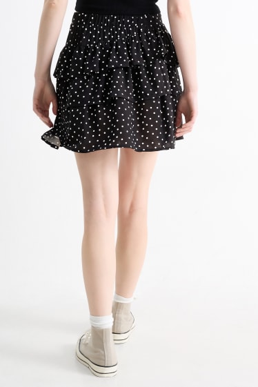 Dames - Minirok - met stippen - zwart