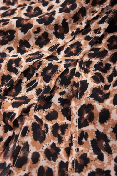Kobiety - Asymetryczna spódnica - nadruk leoparda - beżowy