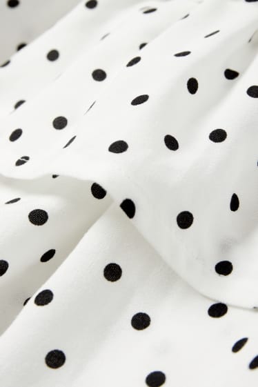 Femmes - Mini-jupe - à pois - blanc