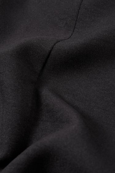 Kinderen: meisjes - Jurk met knoop in de stof - zwart