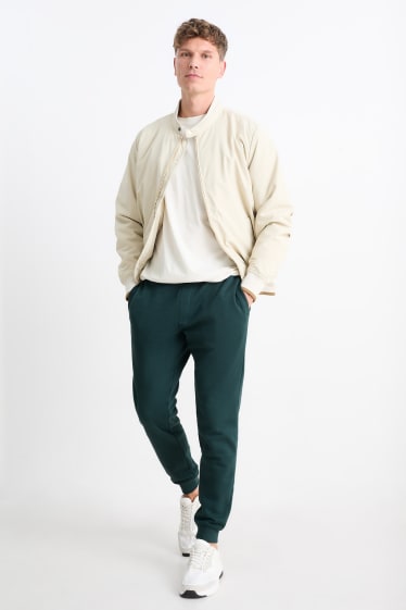 Hommes - Pantalon de jogging - vert foncé