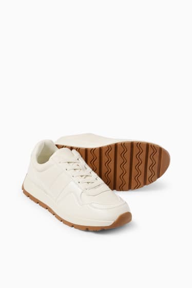 Femmes - Baskets - matière synthétique - beige