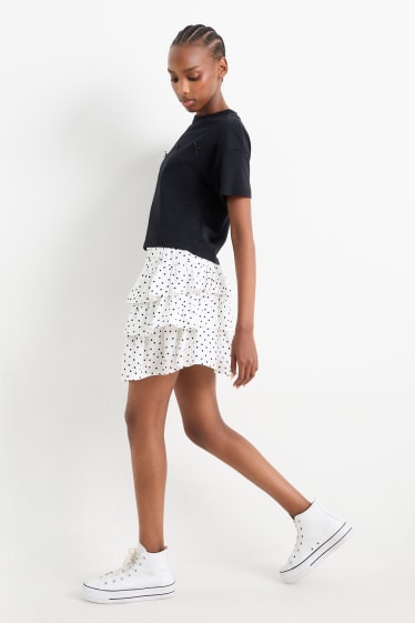 Femmes - Mini-jupe - à pois - blanc