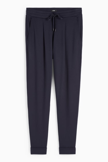 Kobiety - Spodnie z dżerseju - średni stan - tapered fit - ciemnoniebieski