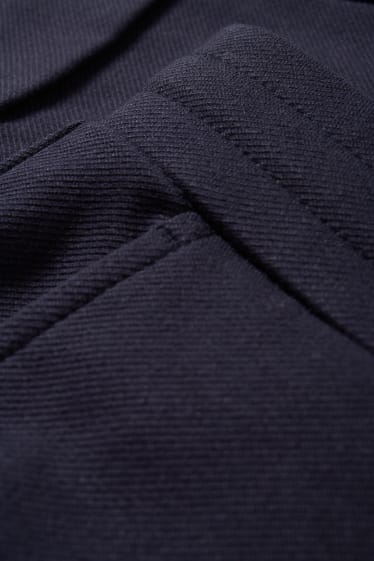 Kobiety - Spodnie z dżerseju - średni stan - tapered fit - ciemnoniebieski
