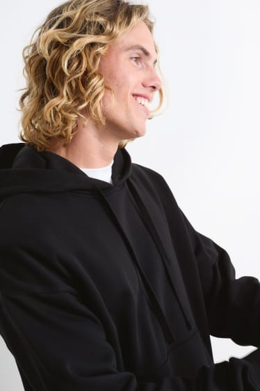 Herren - Oversized-Hoodie - schwarz