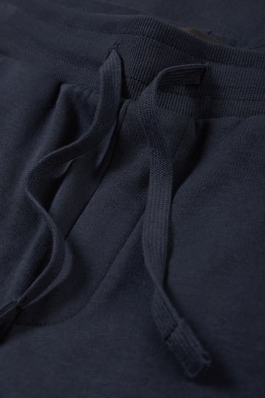 Hommes - Pantalon de jogging - bleu foncé