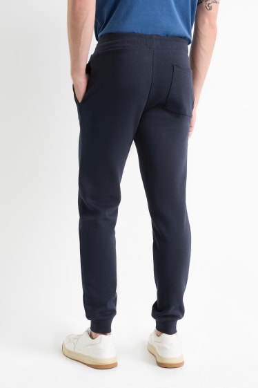 Hommes - Pantalon de jogging - bleu foncé