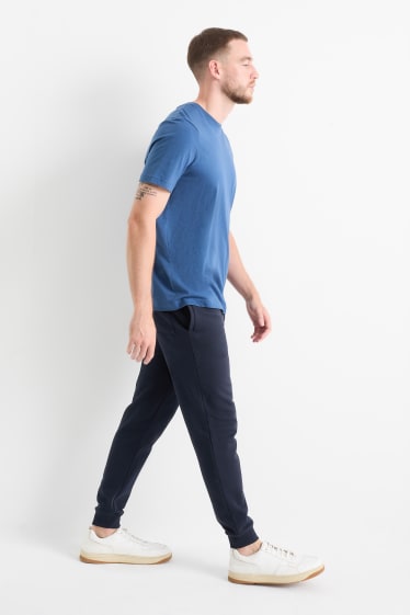 Hommes - Pantalon de jogging - bleu foncé