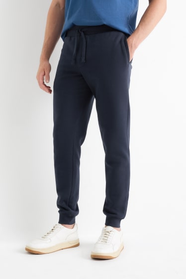 Hommes - Pantalon de jogging - bleu foncé