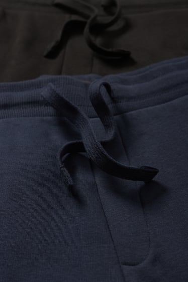 Pánské - Teplákové kalhoty - tmavomodrá